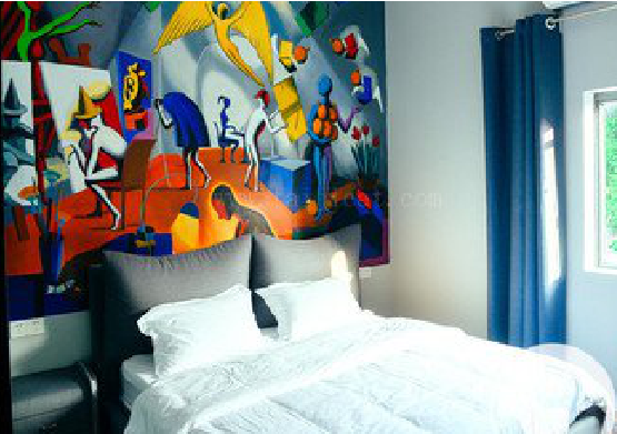 黄平对于酒店的墙体彩绘而言更注重哪些方面?